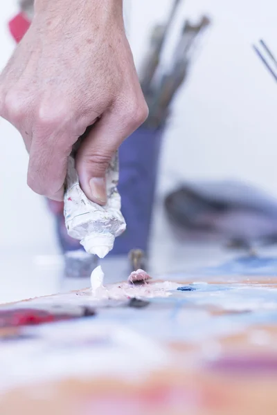 Adding paint - painting session — Stock Photo, Image