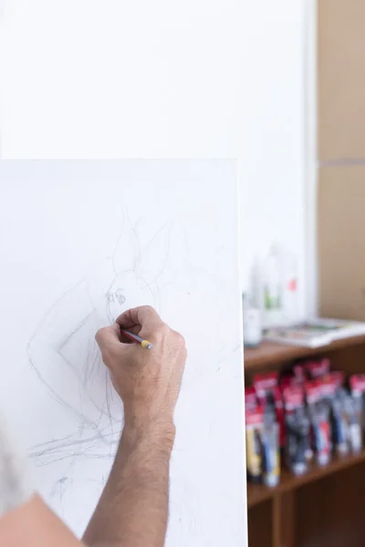Hand drawing on canvas - painting session — Stock Photo, Image