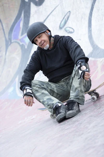 male skater sitting down