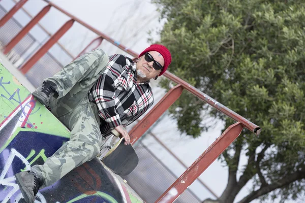 Portrait of an old man skater — Stock Photo, Image