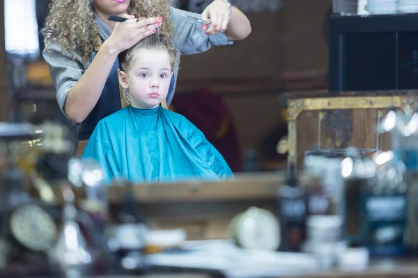 Boy looking at mirror with surprise — Stock Photo, Image