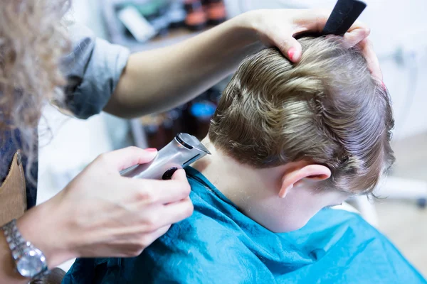 Hairdresser trimming boy neck — Stock Photo, Image