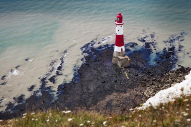 aerial photography of a lighthouse and sea clipart