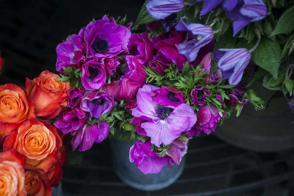Flower for sale. purple anemone in zink bucket — Stock Photo, Image