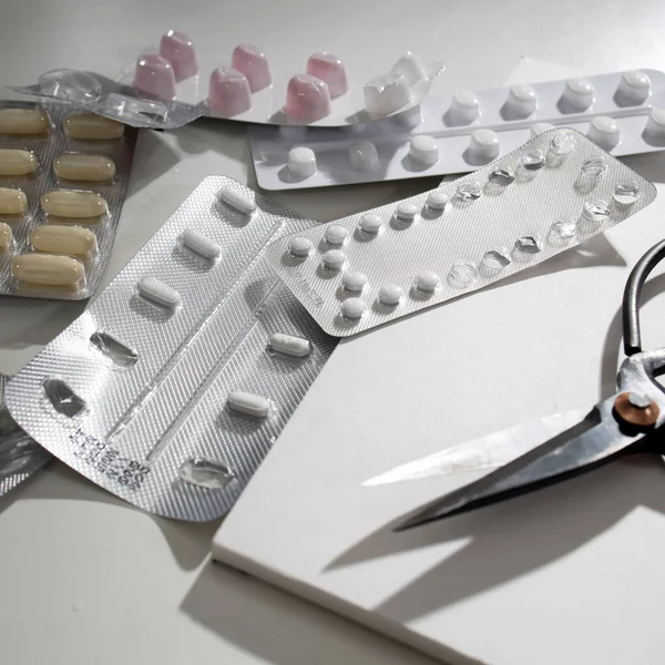 pharmaceuticals antibiotics pills medicine, colorful antibacterials pills on white background , capsule pill medicine
