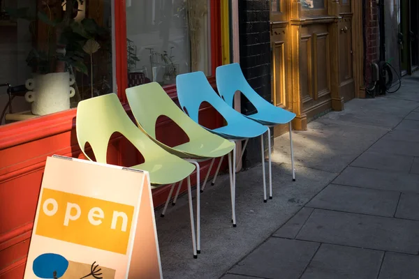 London September 2020 Multi Colored Plastic Chairs Cafe Stand Inscription —  Fotos de Stock