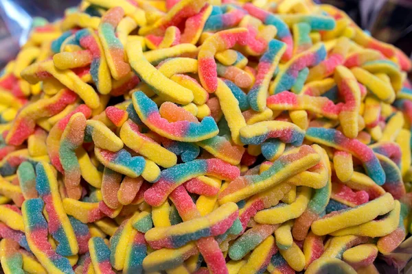 Sweet Gummy Multi Colored Sticks Form Worms Funfair Stand Pile — Stock Photo, Image