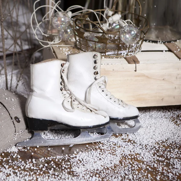 Christmas decoration made by designed vintage skates. Skates on artificial snow — Stock Photo, Image