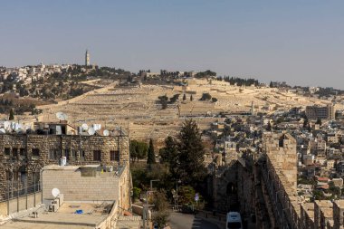jerusalem, Israel, 2 November 2025,  A panoramic view of the vast, ancient Jewish Cemetery on the Mount of Olives, overlooking the densely populated city below.
