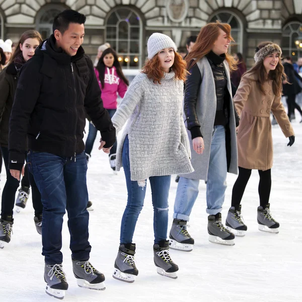 Skaters Beating the Winter Blues at the Annual Christmas Ice Rink — Stock Photo, Image