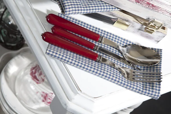 Table setting for meal with spoon, folk, and napkins — Stock Photo, Image