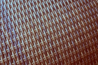 Sentetik rattan dokuma arka planı bahçe mobilyalarında kullanılıyor..