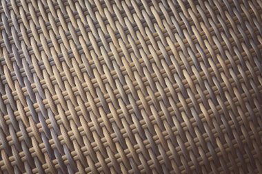 Sentetik rattan dokuma arka planı bahçe mobilyalarında kullanılıyor..