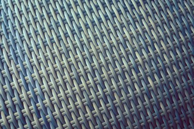 Sentetik rattan dokuma arka planı bahçe mobilyalarında kullanılıyor..