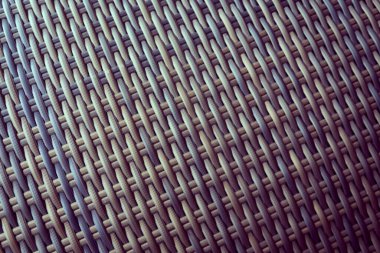 Sentetik rattan dokuma arka planı bahçe mobilyalarında kullanılıyor..