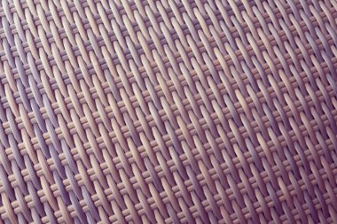 Sentetik rattan dokuma arka planı bahçe mobilyalarında kullanılıyor..