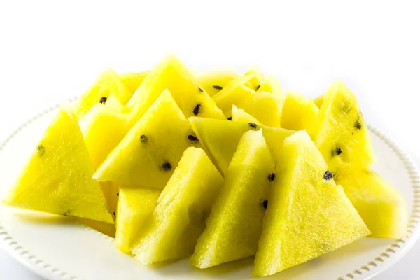 Slices Yellow Watermelon White Disk White Background — Stock Photo, Image