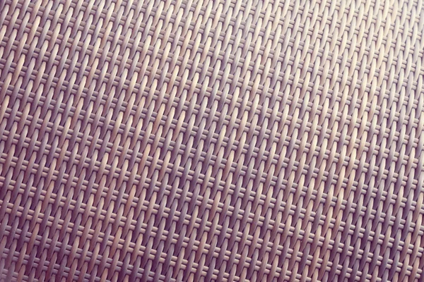 Sentetik rattan dokuma arka planı bahçe mobilyalarında kullanılıyor..