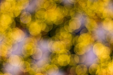 Altın Noel ağacı arkaplanının odaklanmamış bağları