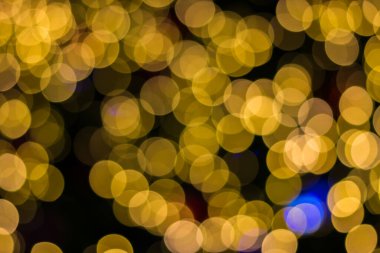 Bokeh Altın Noel ağacı arkaplanının Odaklanmamış Bağları