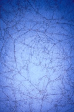 Kırışık arkaplanı olan klasik mavi kağıt dokusu