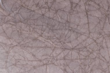 Kırışıklık arkaplanı olan kahverengi kağıt