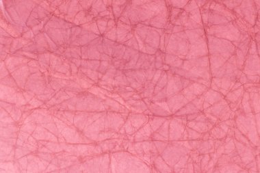 Old light pink crumpled papertexture use for background