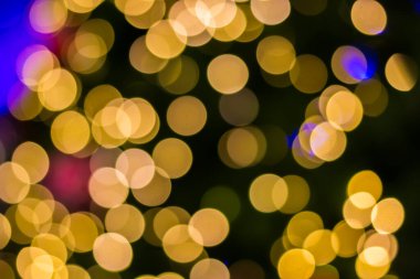 Altın Noel ağacı arkaplanının odaklanmamış bağları