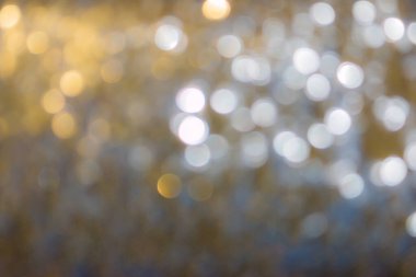 Altın ve gümüş renkli ışıltı soyut arkaplan