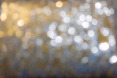 Altın ve gümüş renkli ışıltı soyut arkaplan