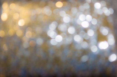 Altın ve gümüş renkli ışıltı soyut arkaplan