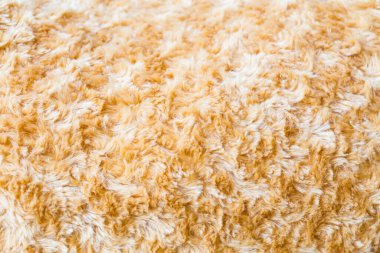 Kahverengi kürk kumaş sentetik doku arkaplanını kapat