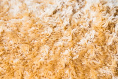 Kahverengi kürk kumaş sentetik doku arkaplanını kapat