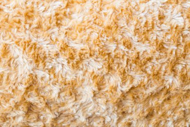 Kahverengi kürk kumaş sentetik doku arkaplanını kapat