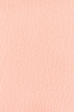 Kanepenin yüzeyinde yapay deri bir arka plan var.