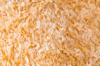 Kahverengi kürk kumaş sentetik doku arkaplanını kapat