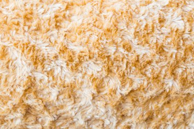 Kahverengi kürk kumaş sentetik doku arkaplanını kapat