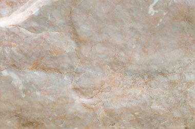 Açık sarı ve gri mermer, doğal desenli ve desenli.