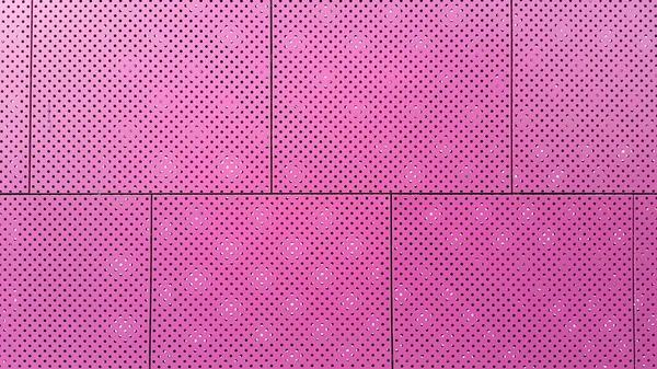 Pink sheet metal with holes background