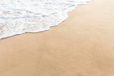 Plaj, deniz dalgası ve arka plan için kum