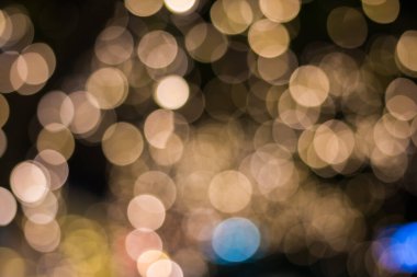 Altın rengi bokeh zarif soyut arkaplan ve bokeh odaklı ışıklar