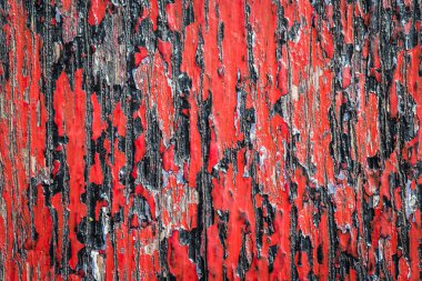 Eski kırmızı ve siyah boyalı tahta çatal kara zemin