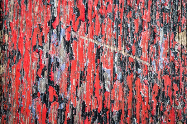 古い赤と黒の塗装木製のクラック黒地 — ストック写真