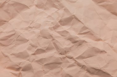 Pembe buruşmuş kağıt yüzey arkaplanı