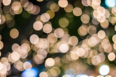 Altın rengi bokeh zarif soyut arkaplan ve bokeh odaklı ışıklar