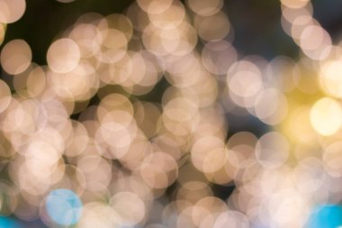 Altın rengi bokeh zarif soyut arkaplan ve bokeh odaklı ışıklar