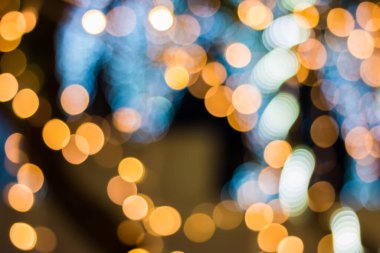 Altın rengi bokeh zarif soyut arkaplan ve bokeh odaklı ışıklar