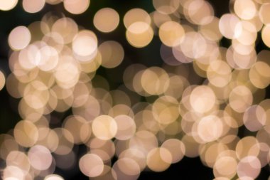 Altın rengi bokeh zarif soyut arkaplan ve bokeh odaklı ışıklar