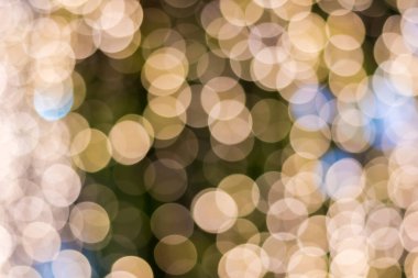 Altın rengi bokeh zarif soyut arkaplan ve bokeh odaklı ışıklar