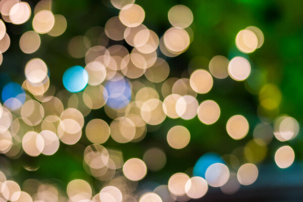 Gold color bokeh elegant abstract background with bokeh defocused lights